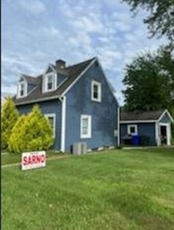 239 Plumtree Road Springfield, MA 01118 - Photo 3 of 14 a view of a house with a yard