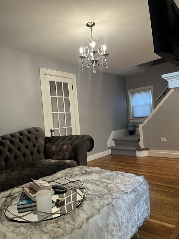 239 Plumtree Road Springfield, MA 01118 - Photo 10 of 14 a bedroom with a bed and couch