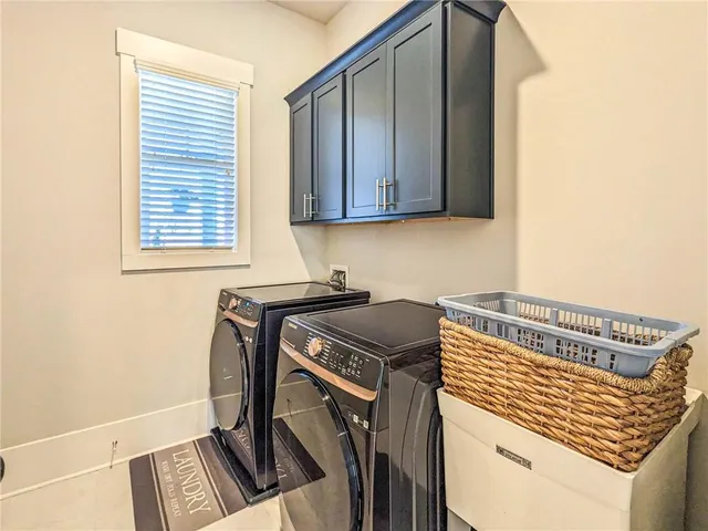 a view of a kitchen from an empty room