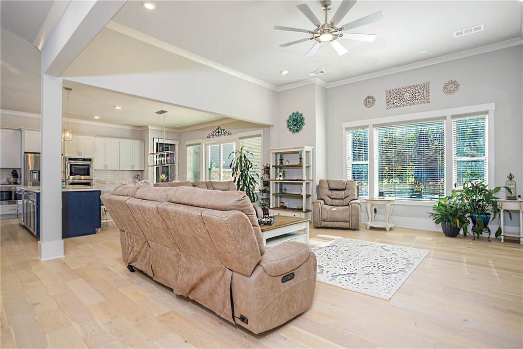 255 Old Town Road Dacula, GA 30019 - Photo 5 of 35 a living room with furniture and a large window with kitchen view