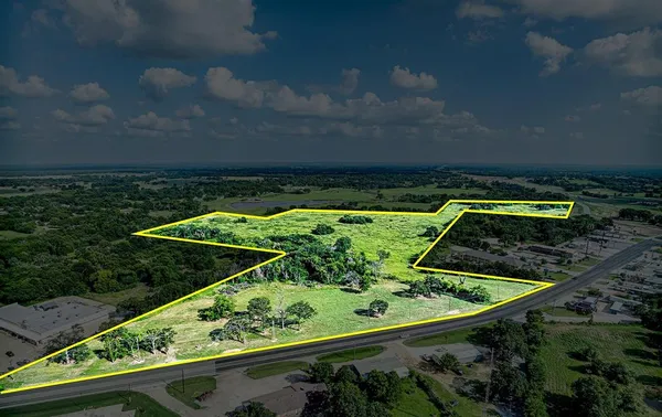 a view of a lake with a city