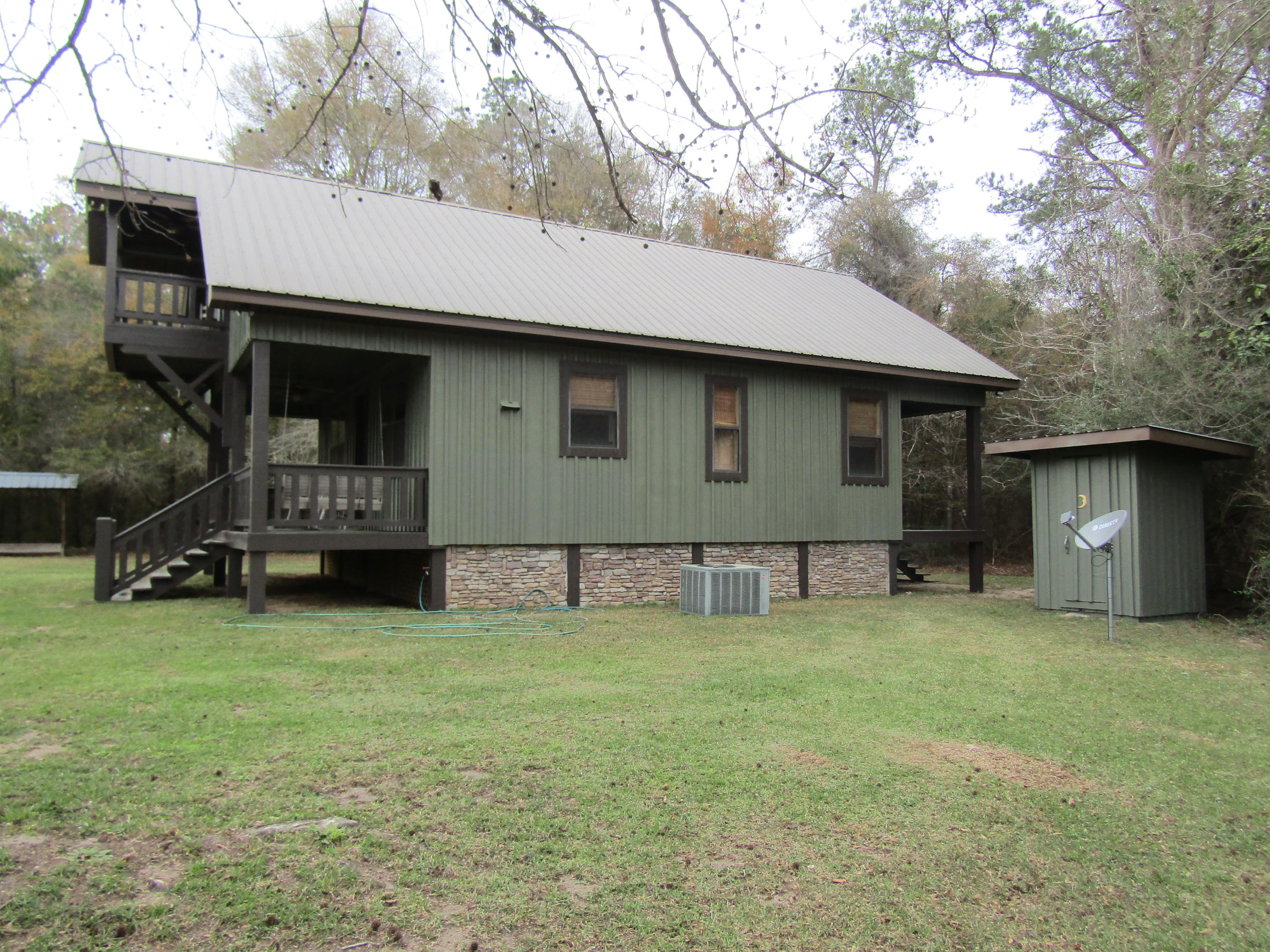 2948 Alford Road Samson, AL 36477 - Photo 58 of 121 a view of a house with a yard and a large tree