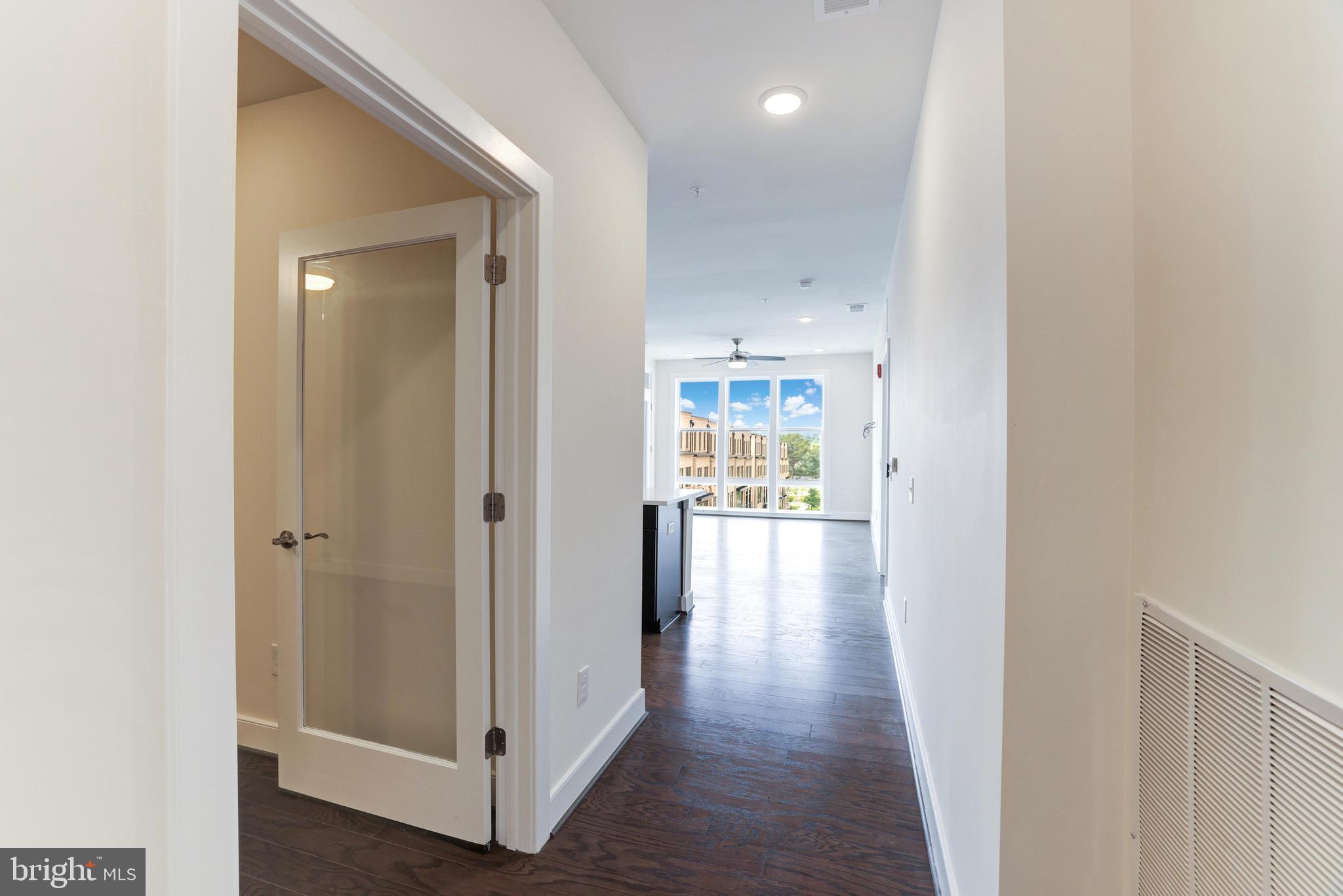 11200 Reston Station Boulevard, Unit 502 Reston, VA 20190 - Photo 15 of 40 French doors to Den