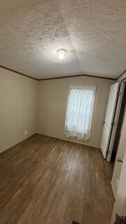 557 Southwest Cutoff, Unit 47 Worcester, MA 01607 - Photo 9 of 10 a view of an empty room and window