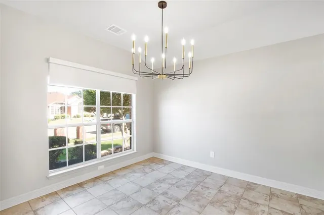 a view of a room with a large windows