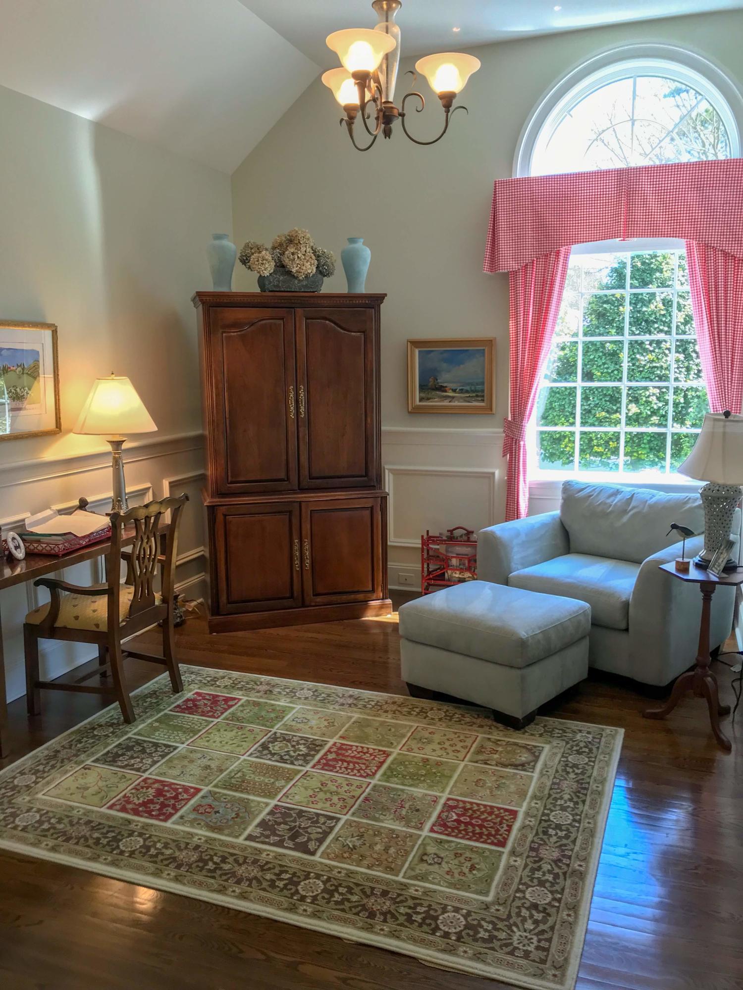 163 Pineleigh Path Osterville, MA 02655 - Photo 14 of 23 a living room with furniture a table and wooden floor