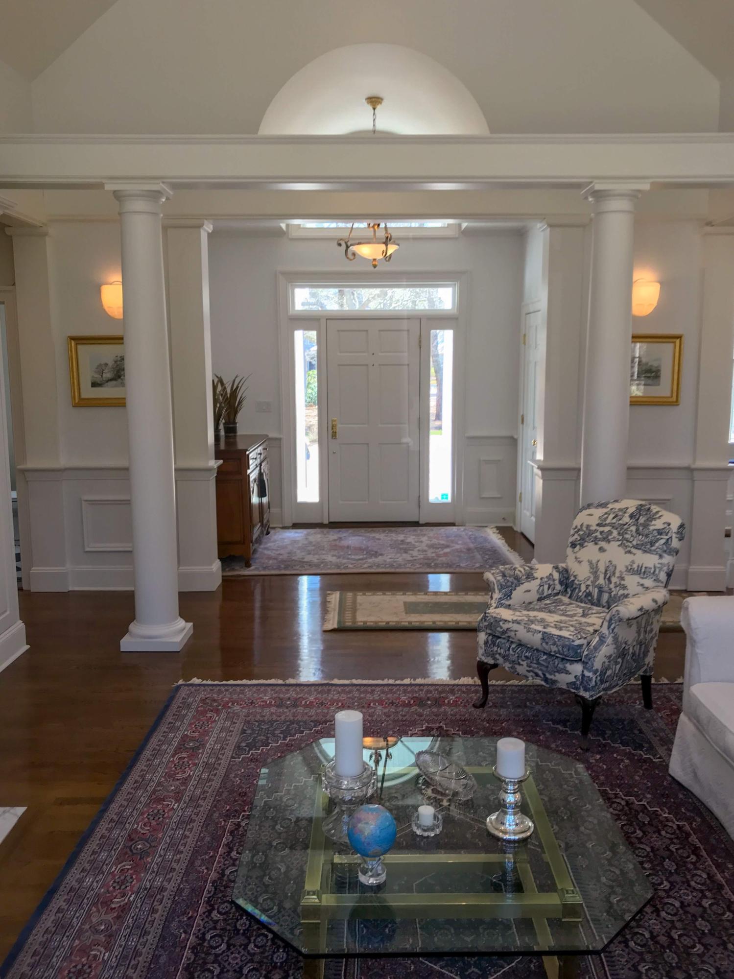 163 Pineleigh Path Osterville, MA 02655 - Photo 4 of 23 a living room with furniture and a chandelier