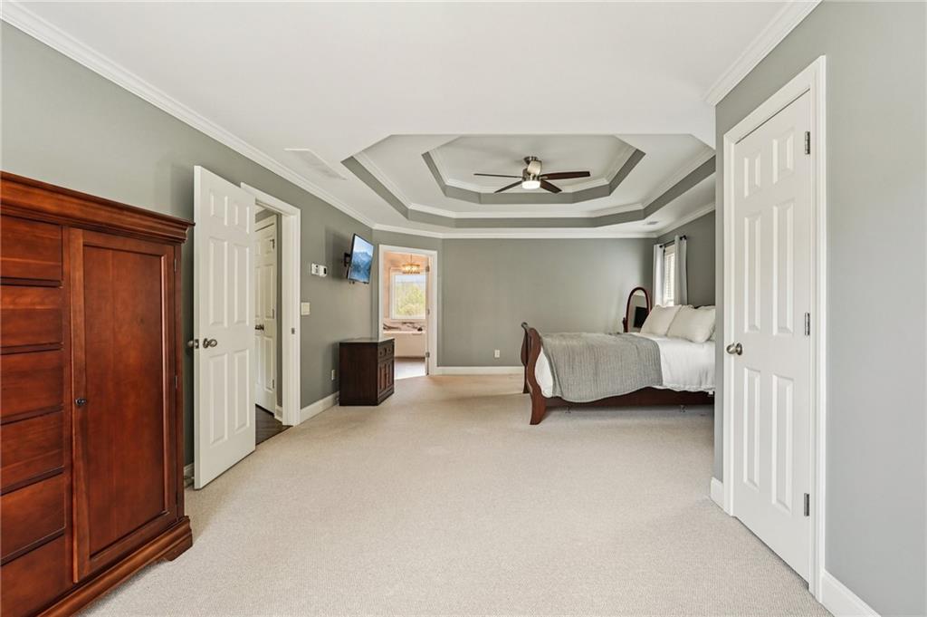 4708 Arbor Crest Place Suwanee, GA 30024 - Photo 39 of 102 a living room with furniture and a window