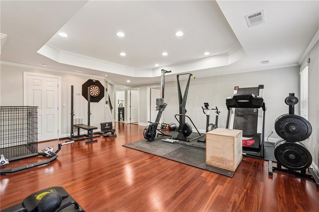 4708 Arbor Crest Place Suwanee, GA 30024 - Photo 62 of 102 a view of a room with gym equipment