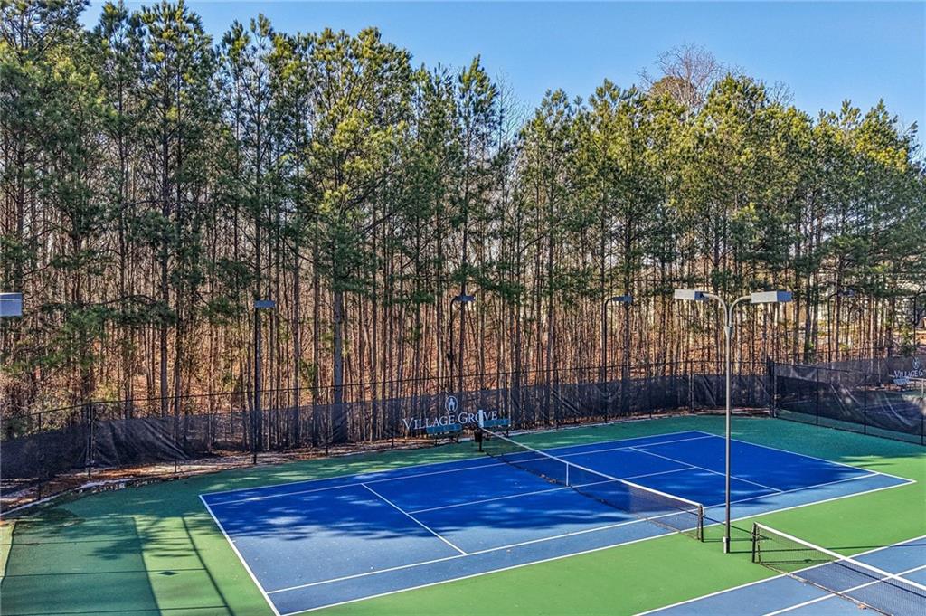 4708 Arbor Crest Place Suwanee, GA 30024 - Photo 91 of 102 a view of an outdoor space and tennis court