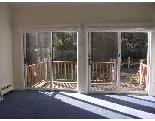 19 Mary Ellen Road Newton, MA 02468 - Photo 6 of 11 a view of a door with a window and wooden floor