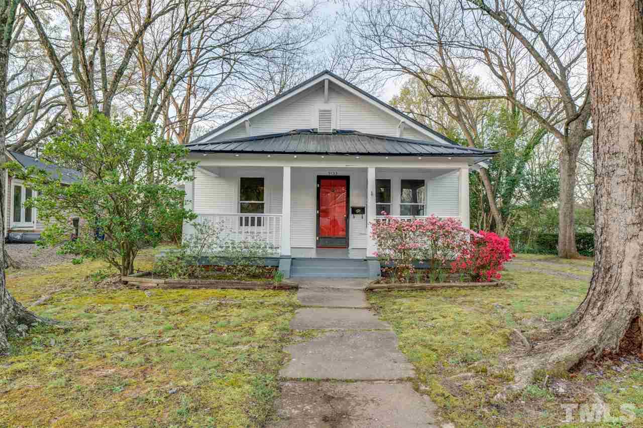 3133 Stanhope Avenue Raleigh, NC 27607 - Photo 1 of 21 a front view of a house with yard