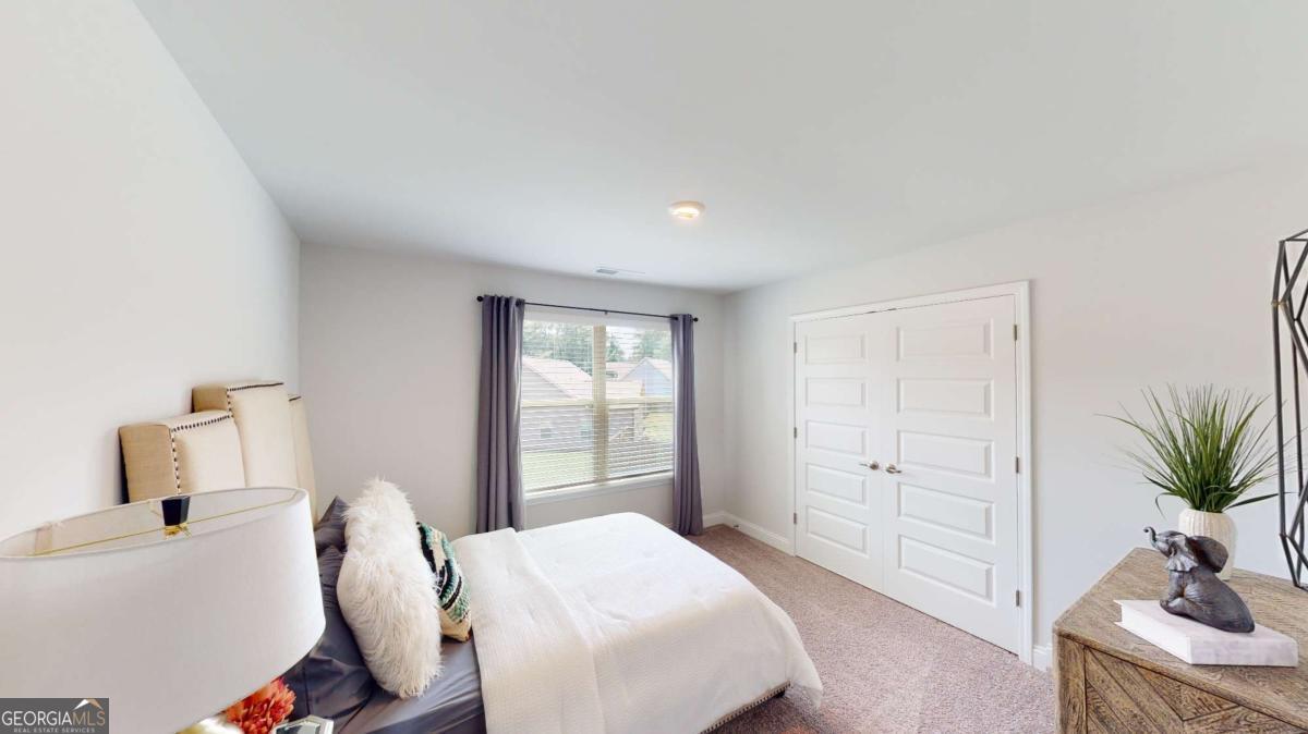 0 Maple Lane Williamson, GA 30292 - Photo 13 of 30 a bedroom with a bed and a window