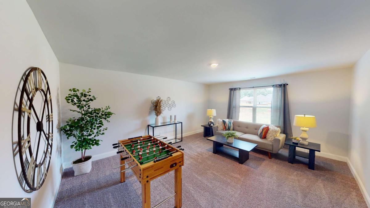 0 Maple Lane Williamson, GA 30292 - Photo 15 of 30 a living room with furniture and a potted plant