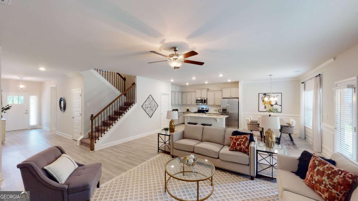 0 Maple Lane Williamson, GA 30292 - Photo 21 of 30 a living room with furniture ceiling fan and a rug