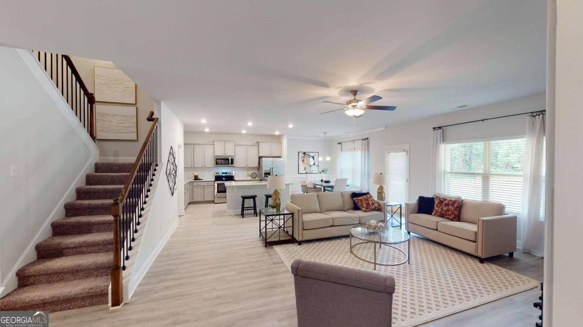 0 Maple Lane Williamson, GA 30292 - Photo 26 of 30 a living room with furniture and a large window