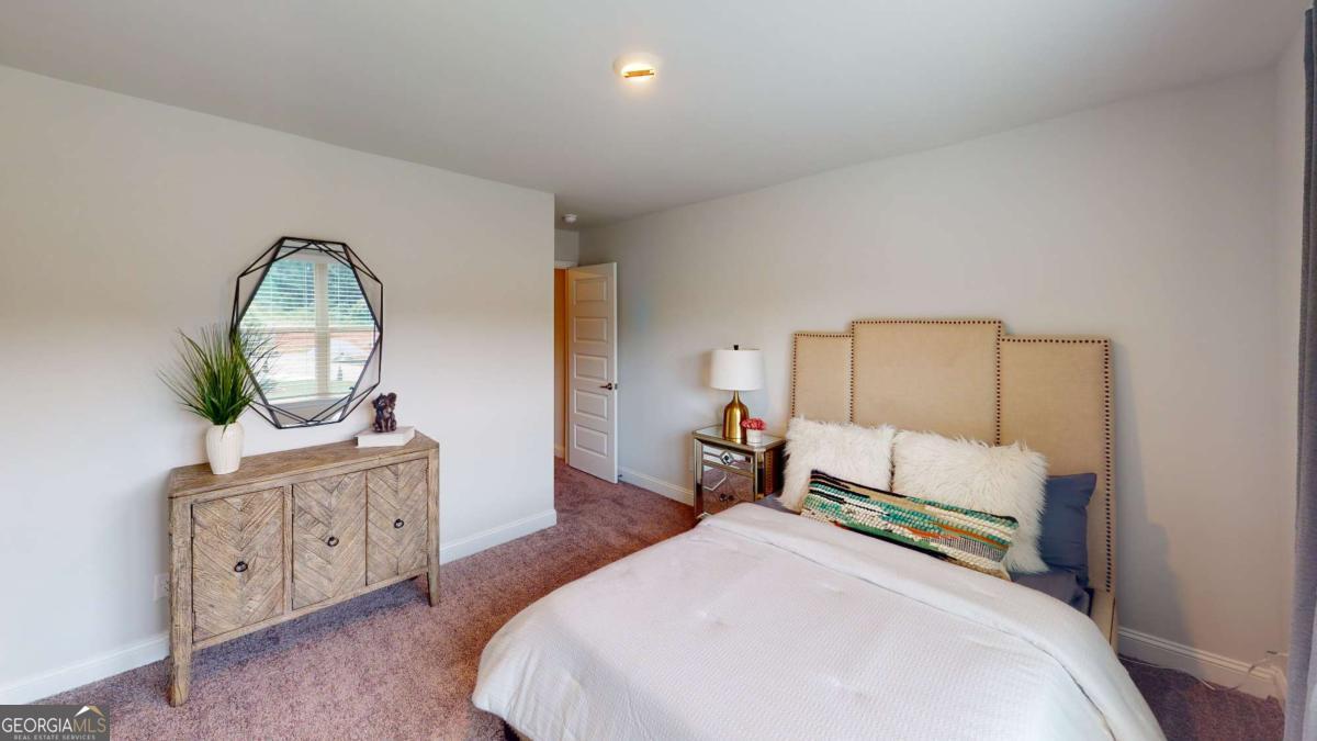 0 Maple Lane Williamson, GA 30292 - Photo 4 of 30 a bed room with a bed and a dresser