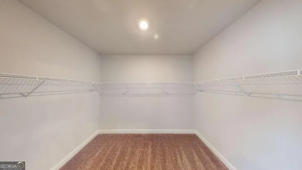 a view of a room with racks on the wall