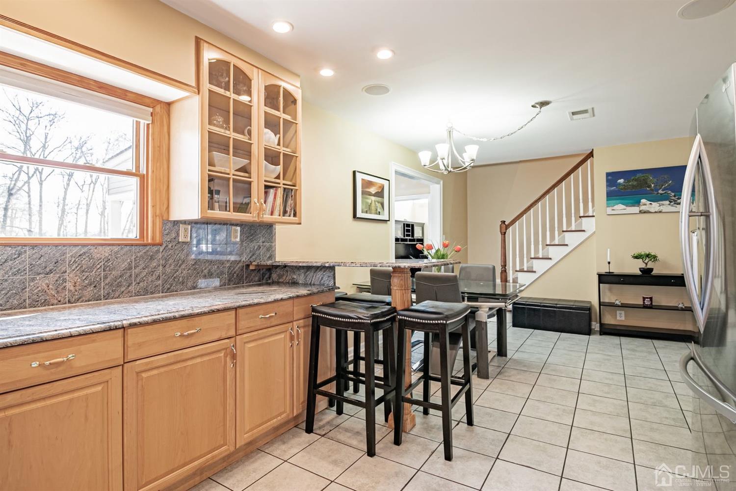 24 Kimberly Road Colonia, NJ 07067 - Photo 11 of 50 a kitchen with stainless steel appliances granite countertop a sink and cabinets