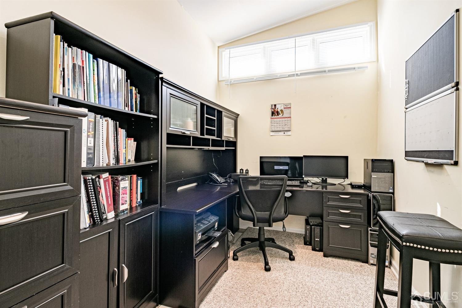 24 Kimberly Road Colonia, NJ 07067 - Photo 12 of 50 a view of a workspace with furniture and a window