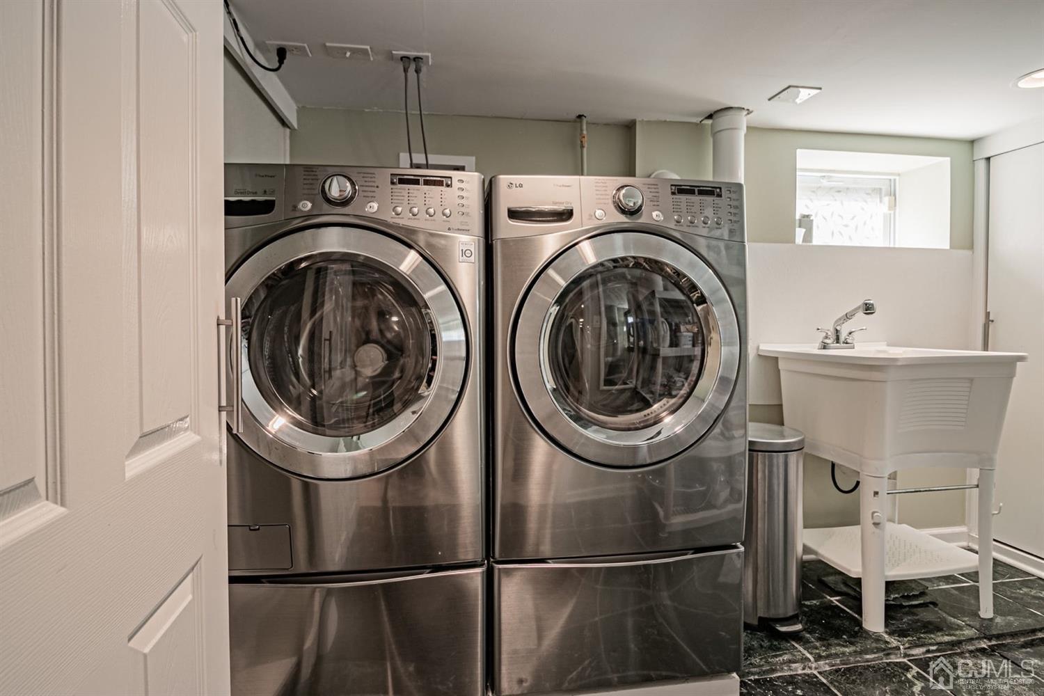 24 Kimberly Road Colonia, NJ 07067 - Photo 30 of 50 a utility room with dryer and washer