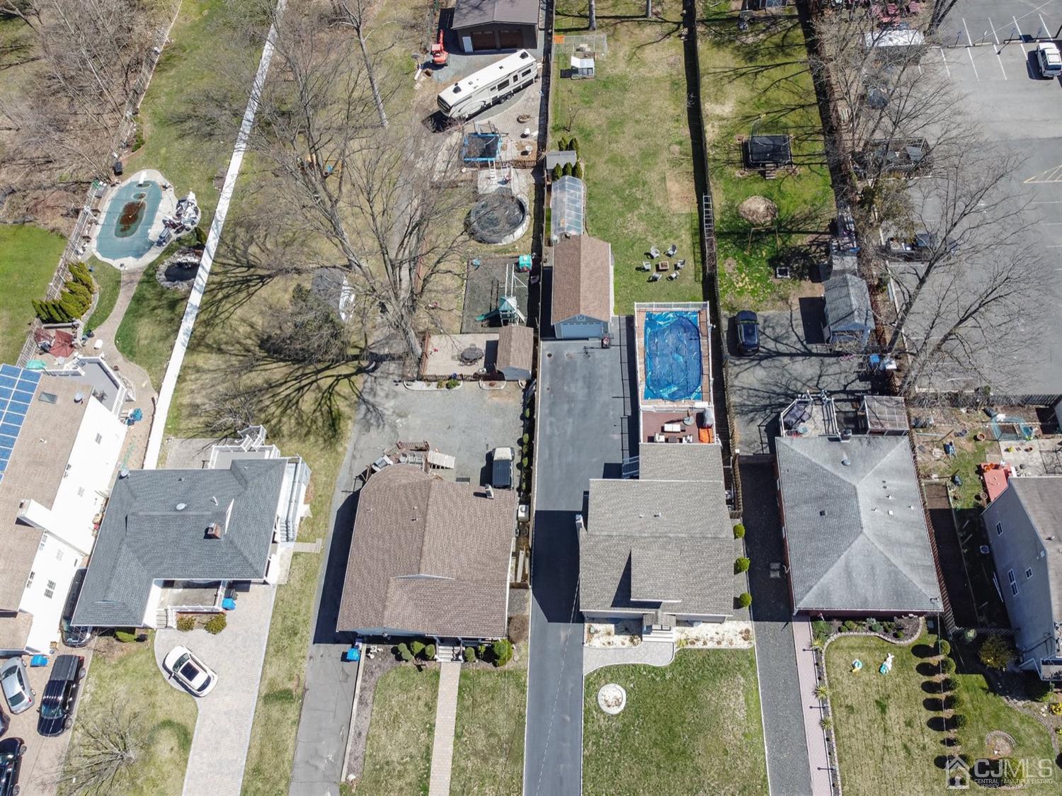 24 Kimberly Road Colonia, NJ 07067 - Photo 38 of 50 an aerial view of residential houses with outdoor space