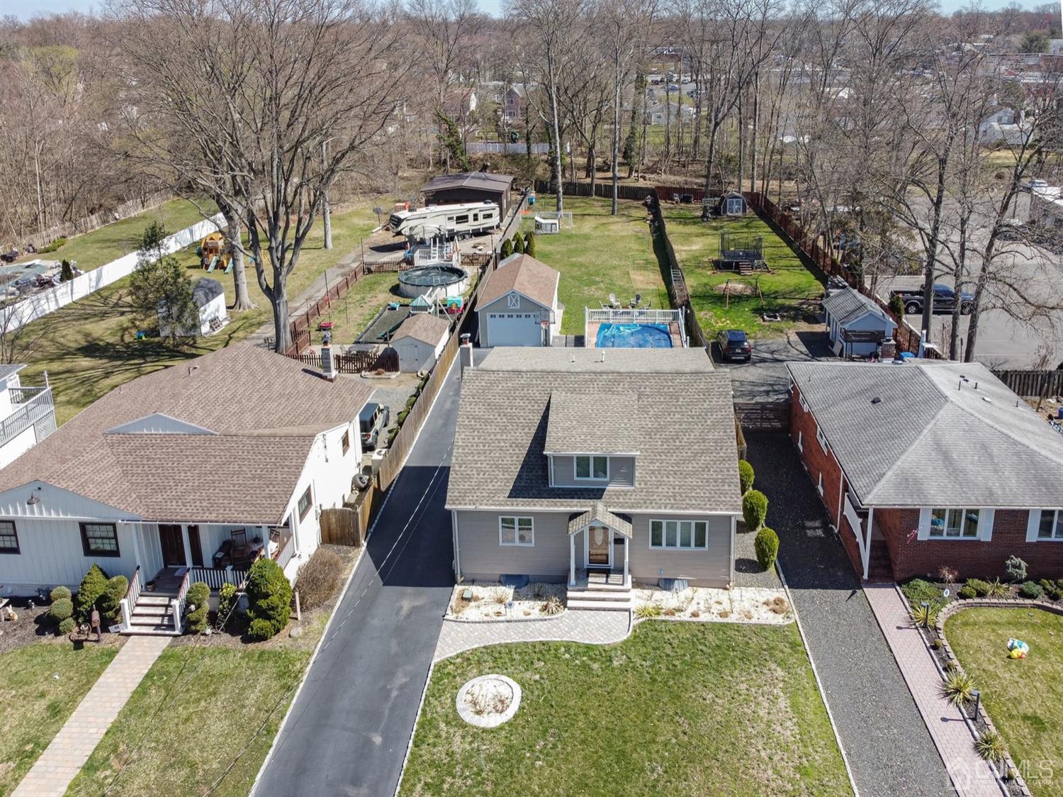 24 Kimberly Road Colonia, NJ 07067 - Photo 44 of 50 an aerial view of a house with swimming pool garden and patio