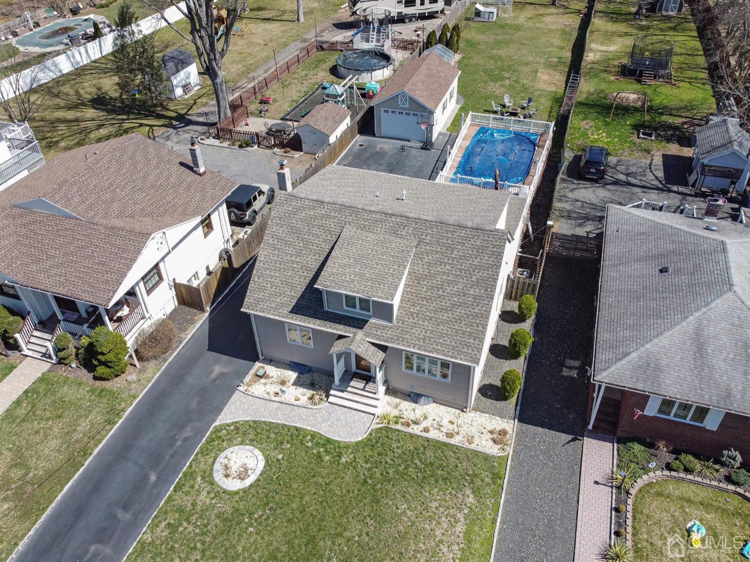 24 Kimberly Road Colonia, NJ 07067 - Photo 45 of 50 an aerial view of a house with swimming pool