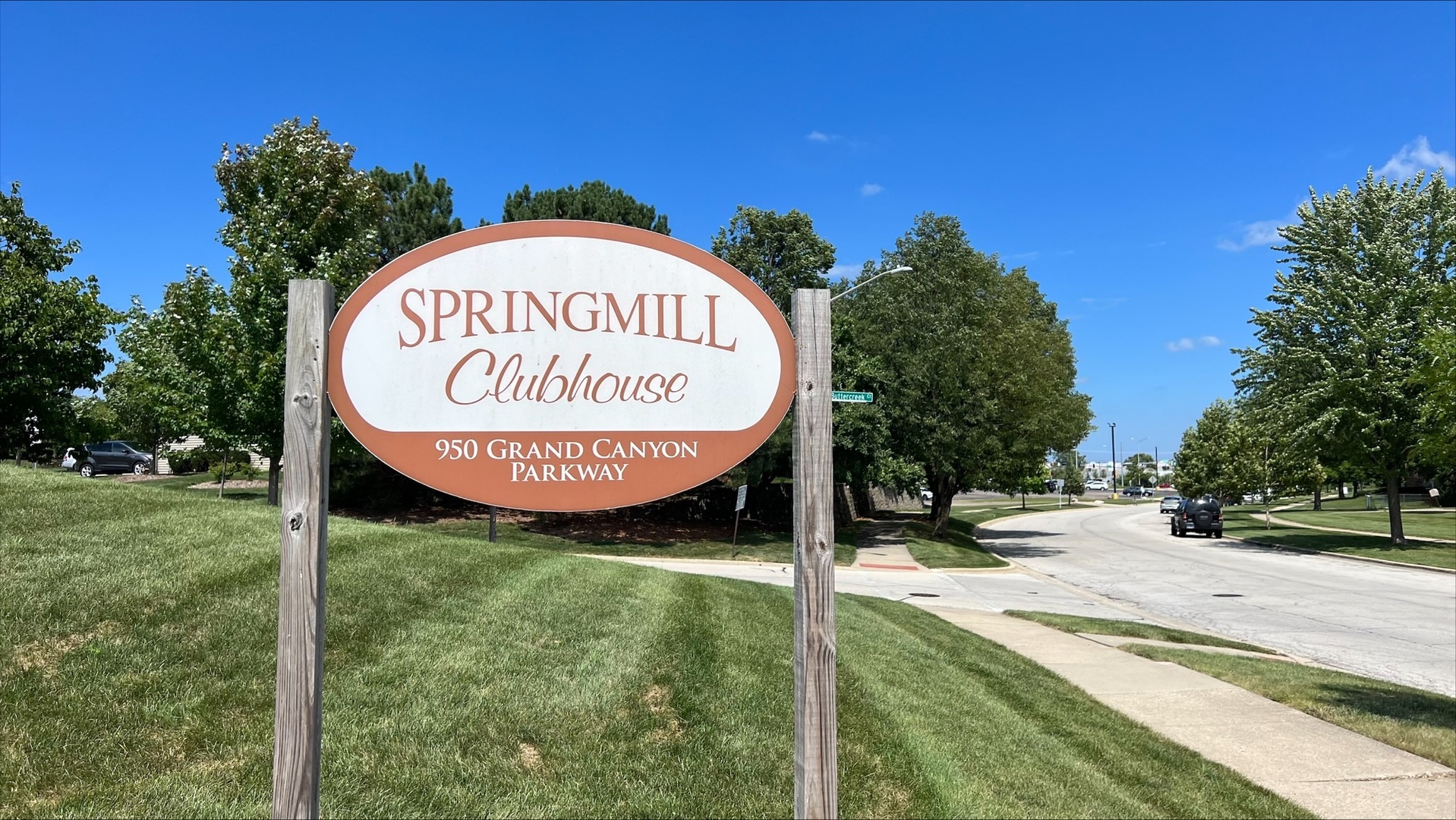 1009 Spring Mill Drive Hoffman Estates, IL 60169 - Photo 20 of 35 a sign of golf club on a wall under a tree