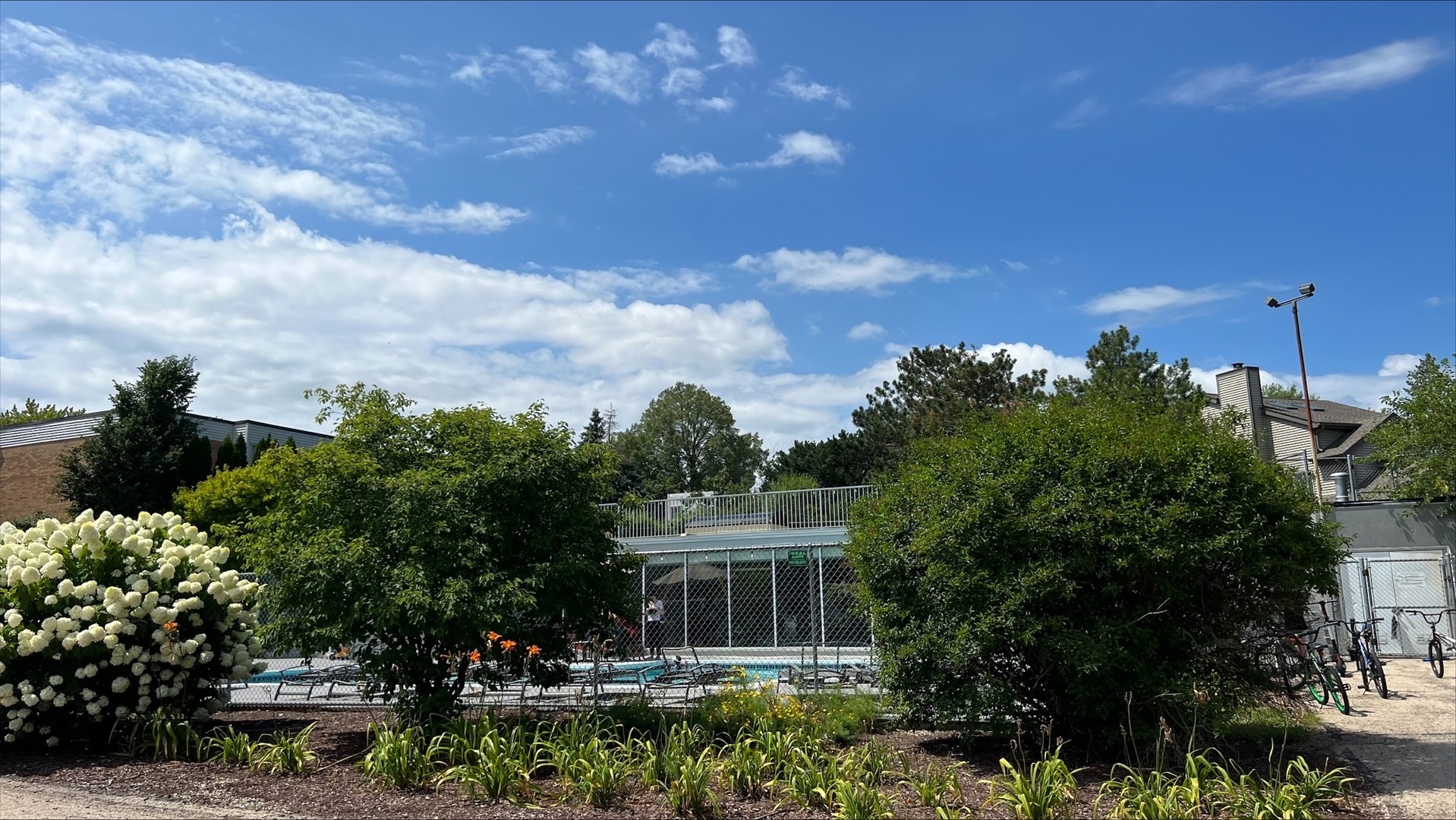 1009 Spring Mill Drive Hoffman Estates, IL 60169 - Photo 30 of 35 a front view of a house with a yard