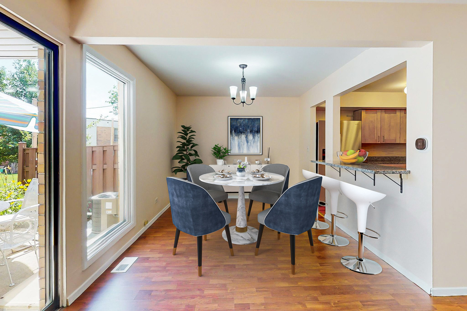 1009 Spring Mill Drive Hoffman Estates, IL 60169 - Photo 4 of 35 a view of a dining room with furniture window and wooden floor