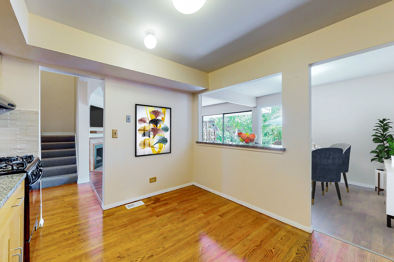 1009 Spring Mill Drive Hoffman Estates, IL 60169 - Photo 8 of 35 a view of a livingroom with furniture and wooden floor
