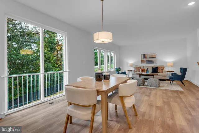 a view of a dining room with furniture window and outside view
