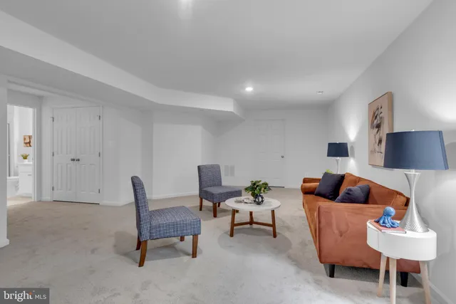 a view of a livingroom and a dishwasher and workspace
