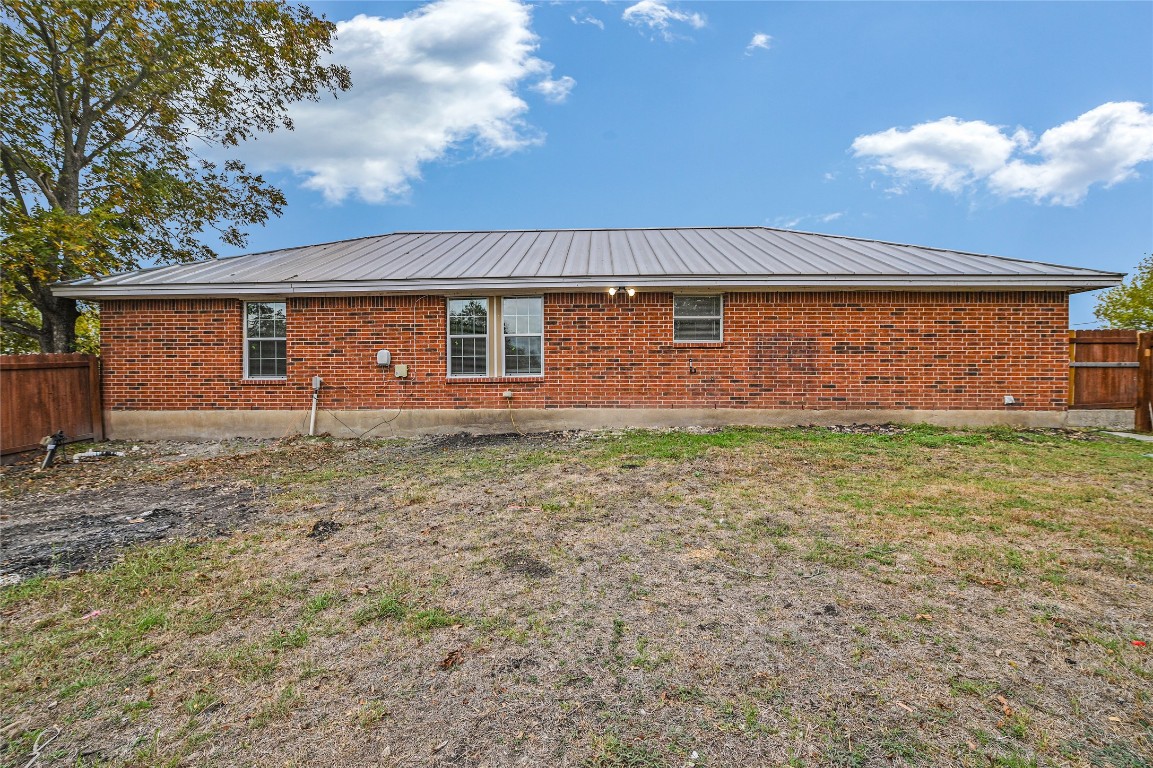 200 Creekside Trail Kyle, TX 78640 - Photo 18 of 19 front view of house with a yard