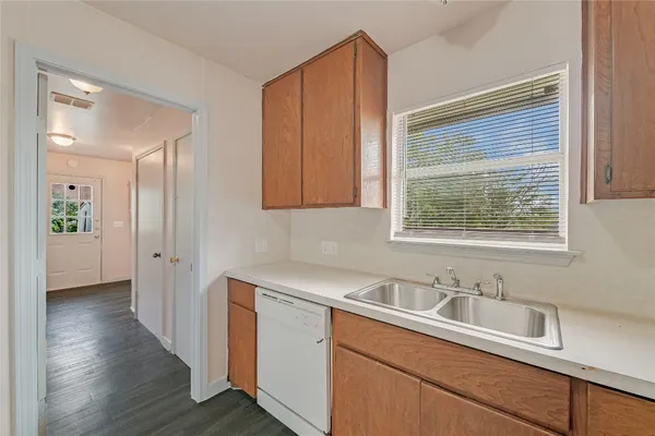 a view of a sink and a window