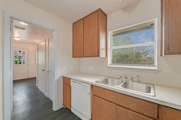 a view of a sink and a window