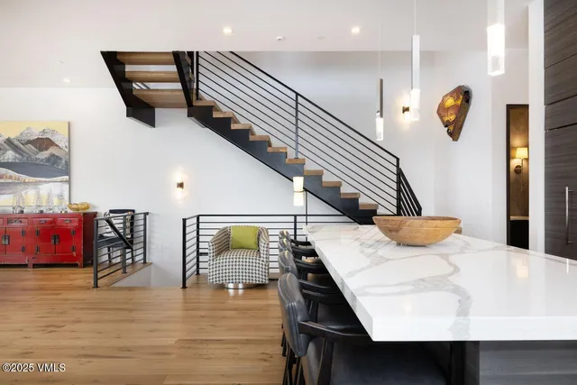 a kitchen with lots of counter space a sink and appliances