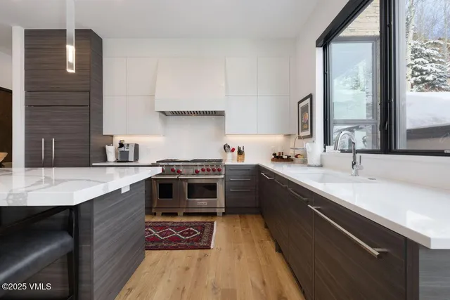 a bedroom with a large bed and a large window