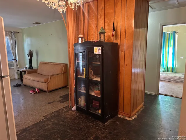 a view of a livingroom with furniture and windows