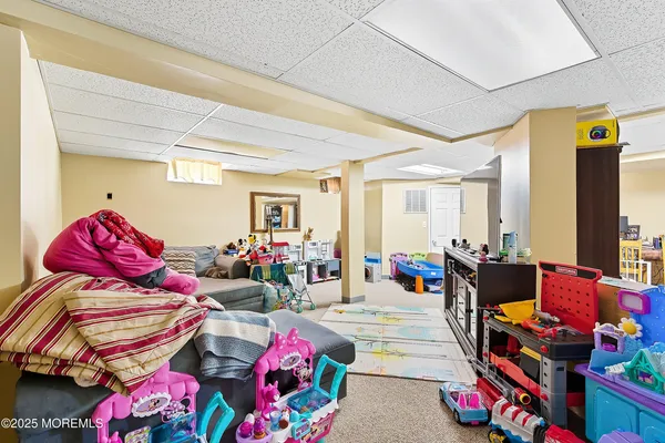 a living room with lots of furniture and couch