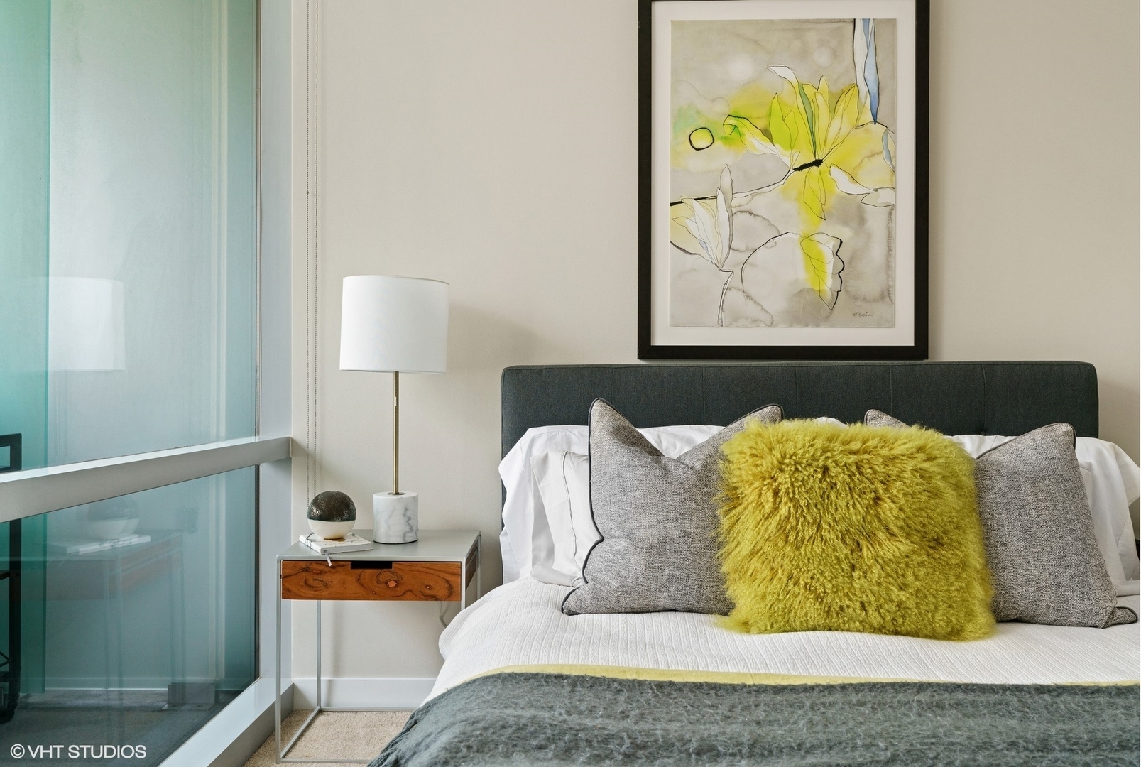 8 East Randolph Street, Unit 3207 Chicago, IL 60601 - Photo 11 of 16 a bed sitting in a bedroom next to a lamp