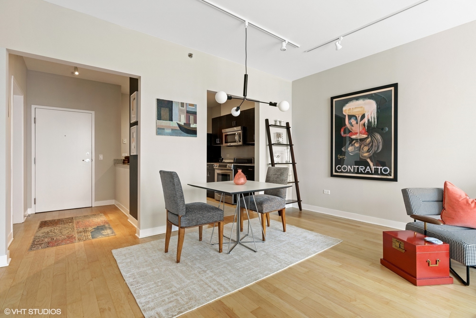 8 East Randolph Street, Unit 3207 Chicago, IL 60601 - Photo 8 of 16 a living room with furniture and wooden floor