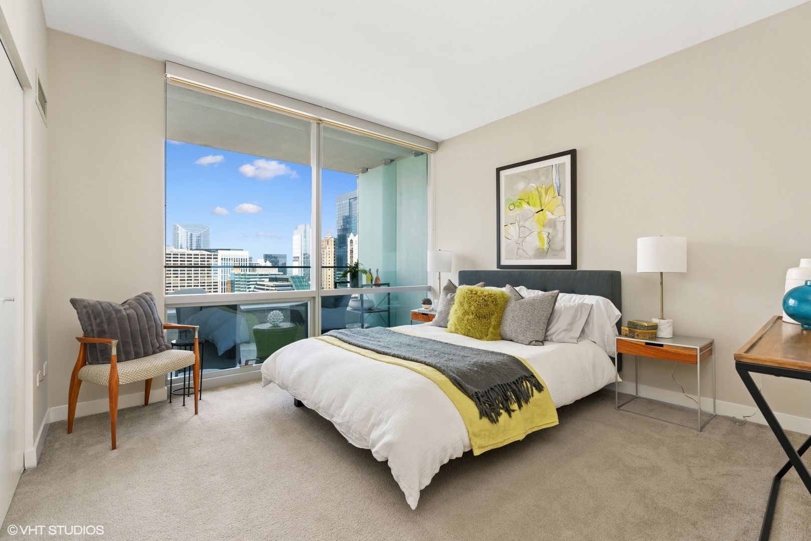 8 East Randolph Street, Unit 3207 Chicago, IL 60601 - Photo 9 of 16 a bed room with a bed and chair