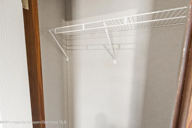 a bathroom with a shower and a shower curtain