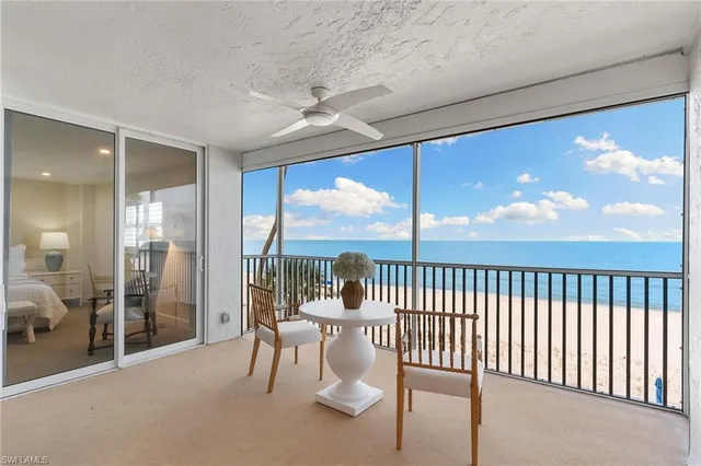 a view of a porch with a furniture