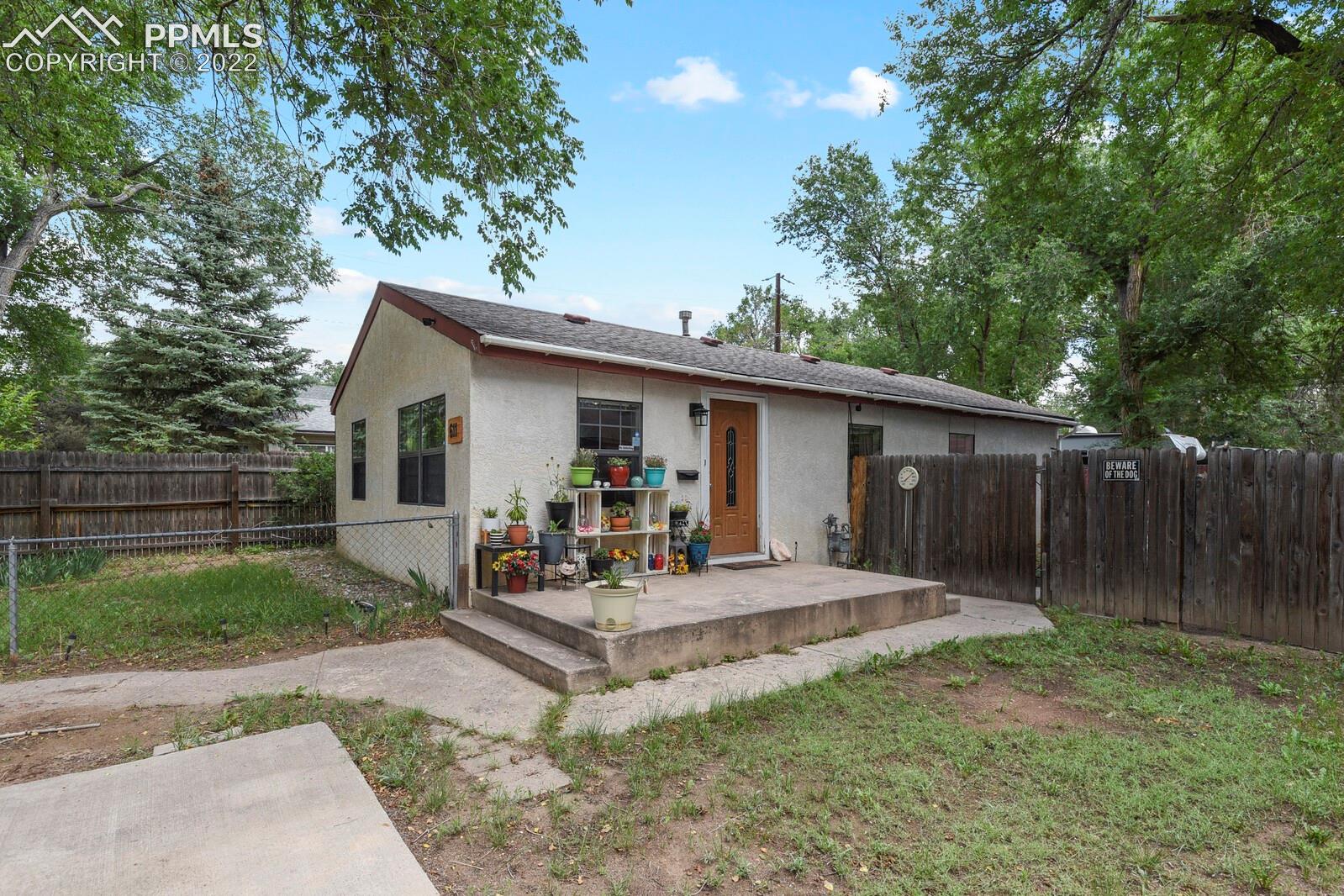 611 Alexander Road Colorado Springs, CO 80909 - Photo 1 of 24 WELCOME HOME!!
