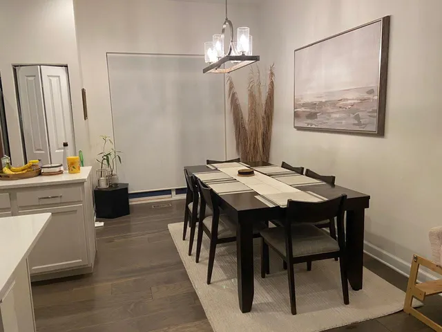 a view of a dining room with furniture