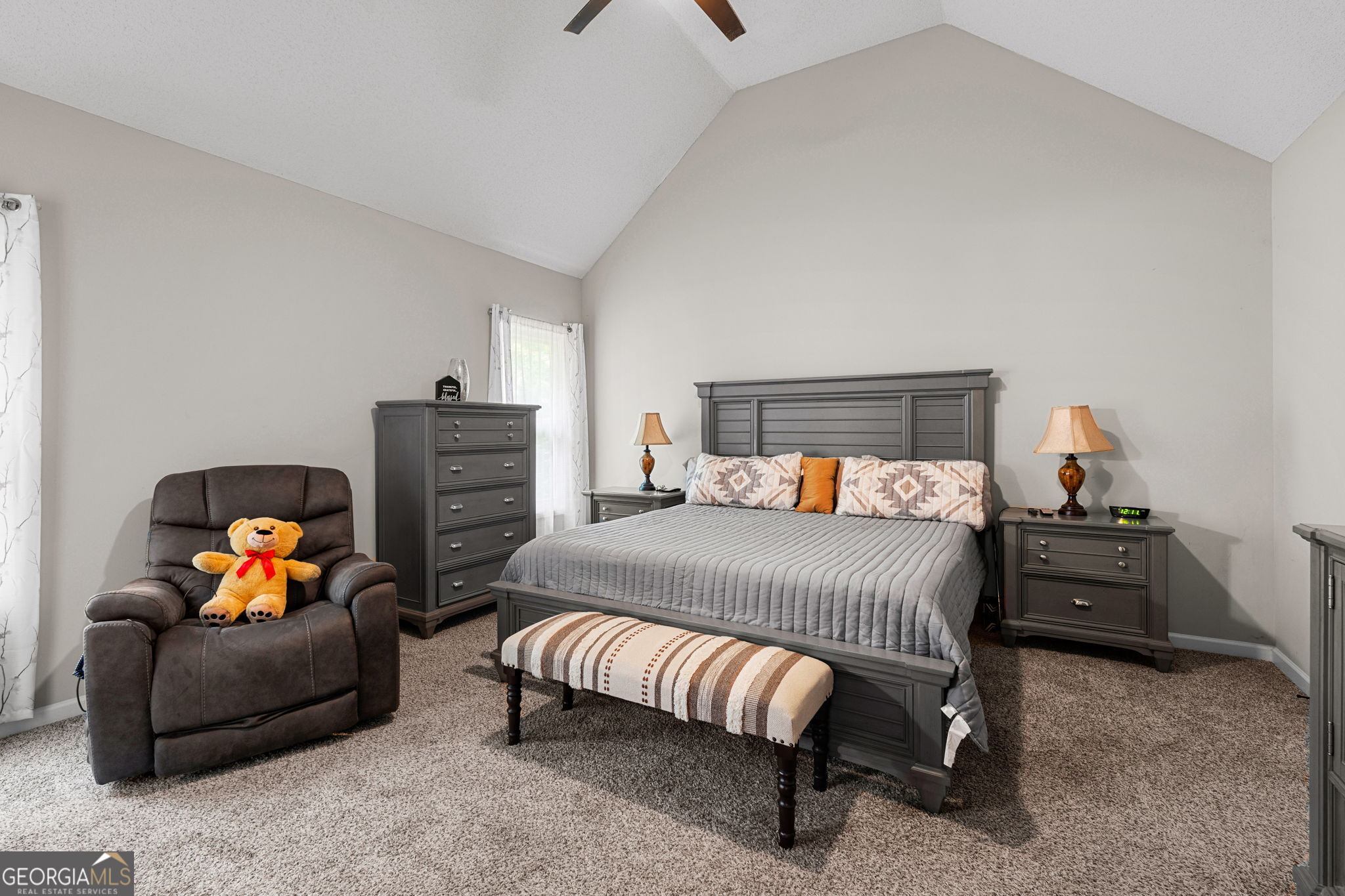 375 Gaelic Way Tyrone, GA 30290 - Photo 28 of 54 a bedroom with furniture and a couch