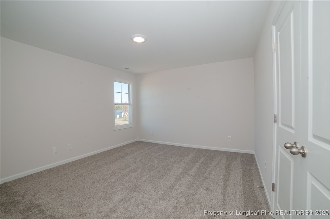 164 Ziggy Way Raeford, NC 28376 - Photo 19 of 25 a view of an empty room and window